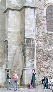 The menhir draws people to it, even now...